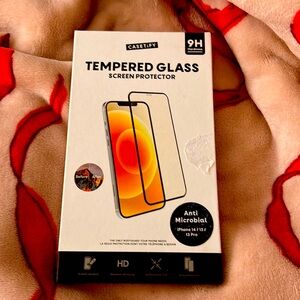 Brand New unopened Casetify case and screen protector. Fits Iphone 14